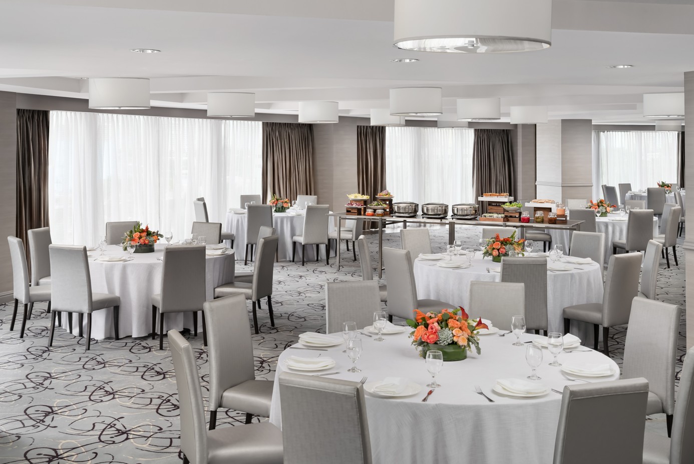 a room with tables and chairs