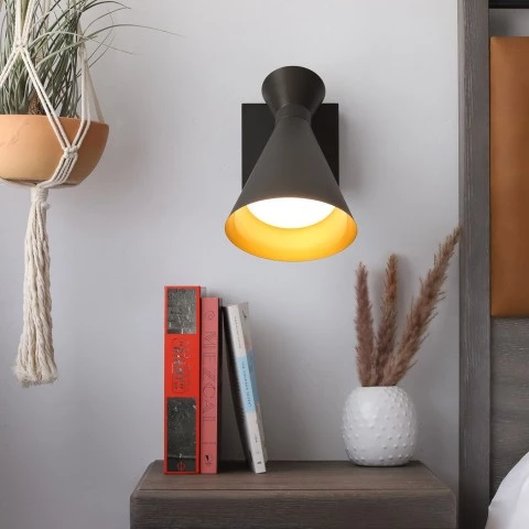a lamp and books on a table