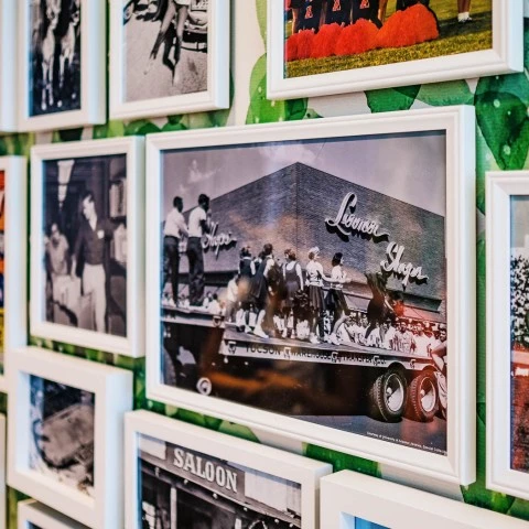 a wall with pictures on it