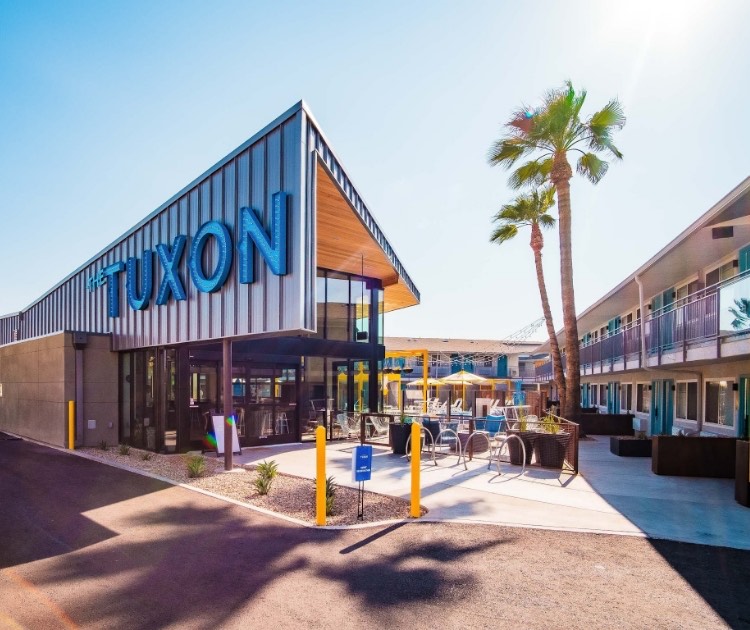 a building with a tree in front