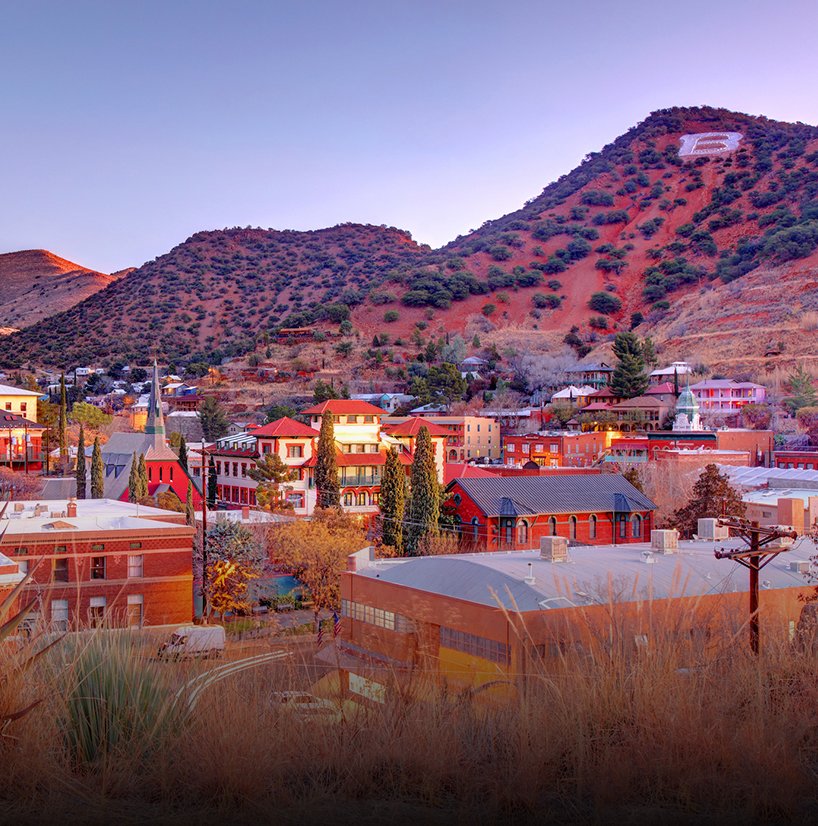 a town with mountains in the background