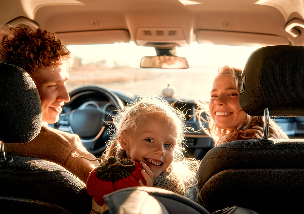 a group of people in a car