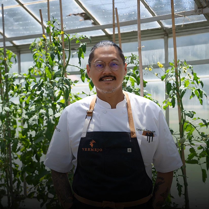 a man in a greenhouse