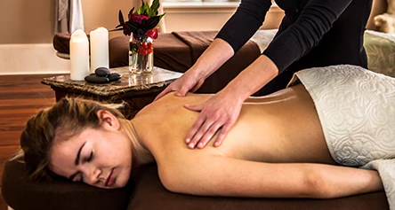 a woman receiving a back massage