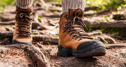 a person's feet in boots