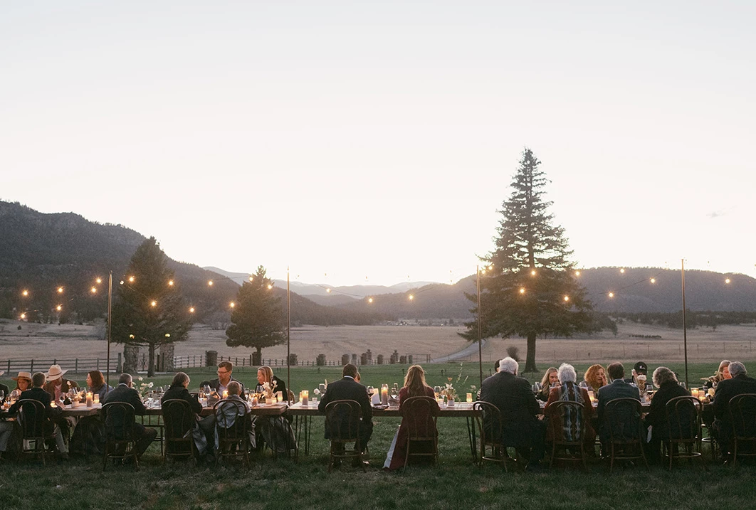 a group of people sitting at a table