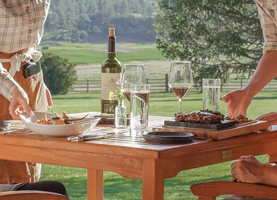 a group of people eating outside