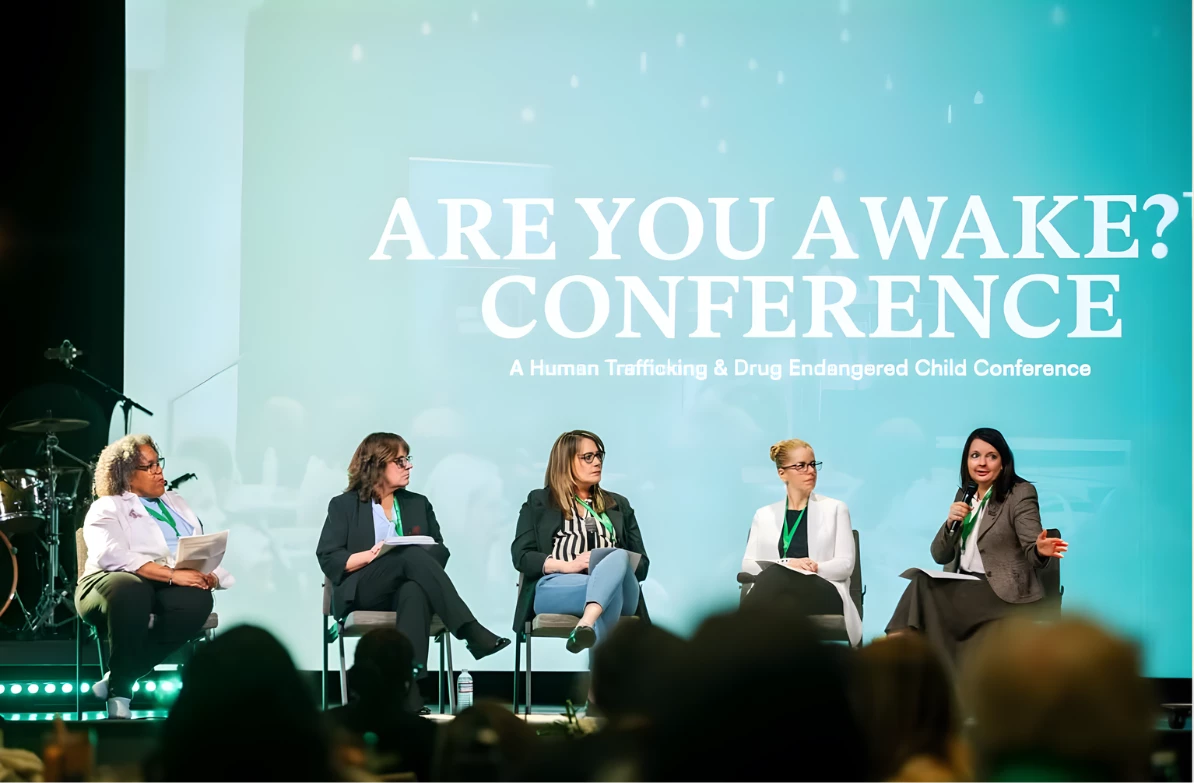 a group of women sitting in chairs