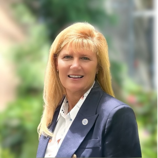 a woman smiling at the camera