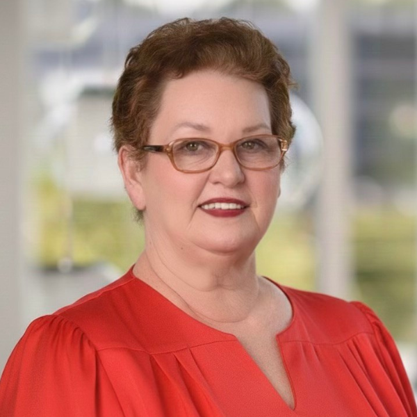 a woman in a red blouse
