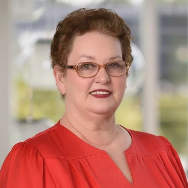 a woman in a red blouse