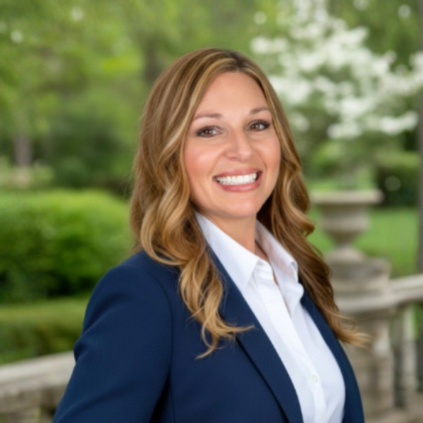 a woman smiling at the camera
