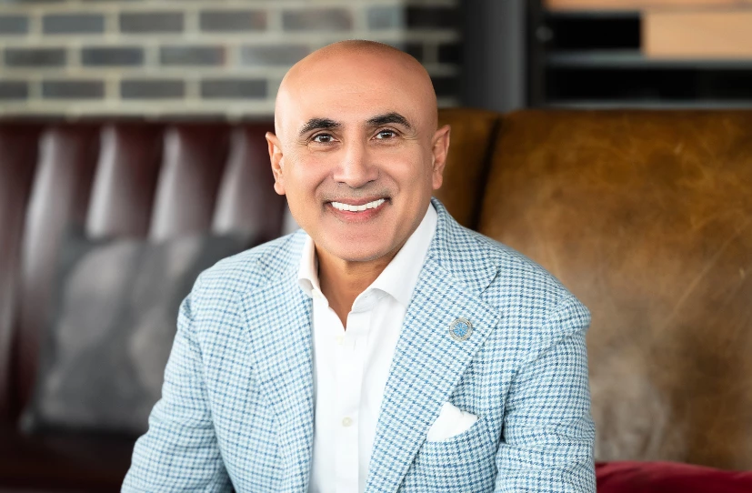 a man smiling at camera