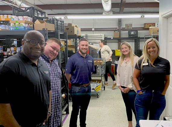 the people volunteering in the nourish food bank