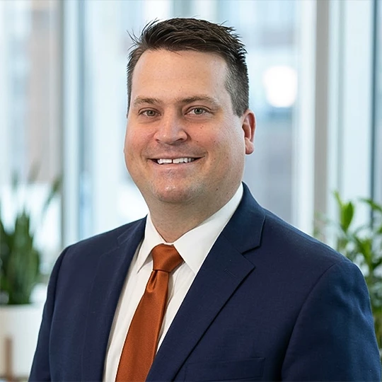 a man in a suit and tie