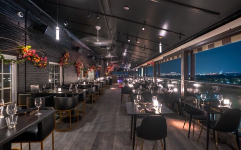 a restaurant with tables and chairs