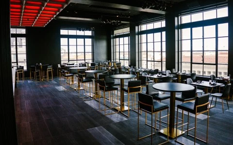 a room with tables and chairs