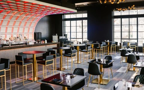 a room with tables and chairs