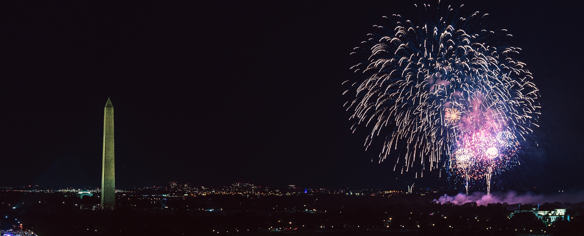 fireworks in the sky over a city