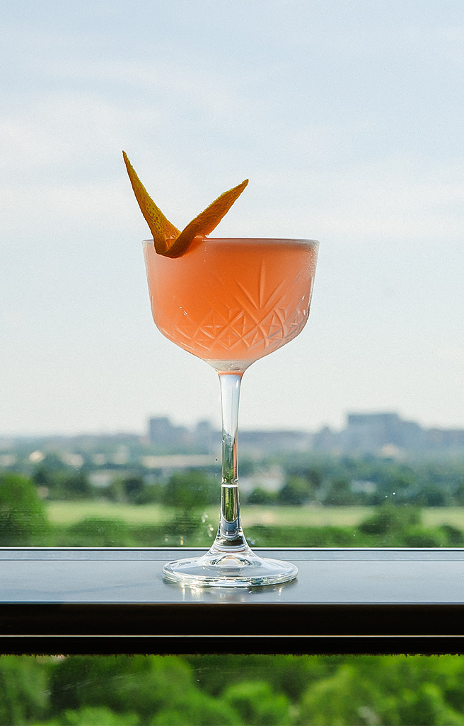 a glass with a drink in it