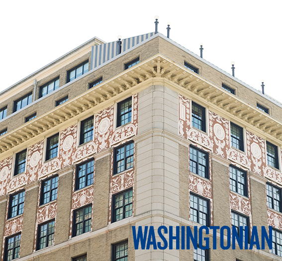 a building with a white and brown design