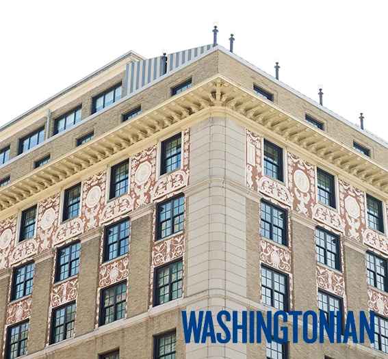 a building with a white and brown design