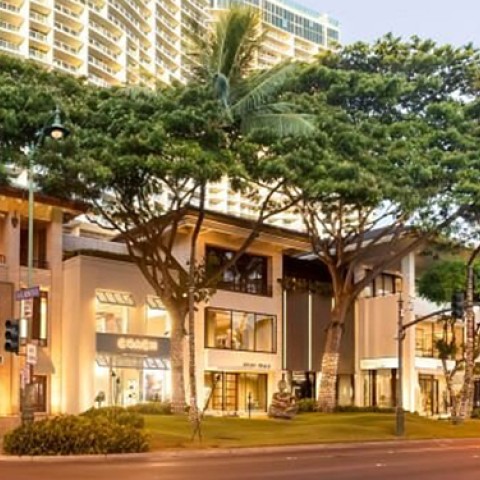 a building with trees in front of it