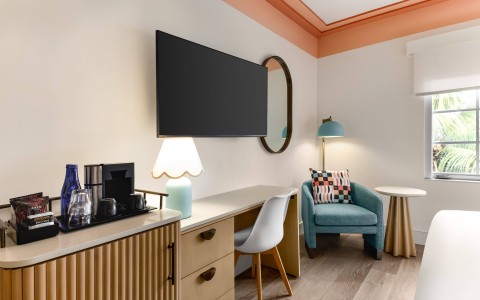 a room with a tv and a chair