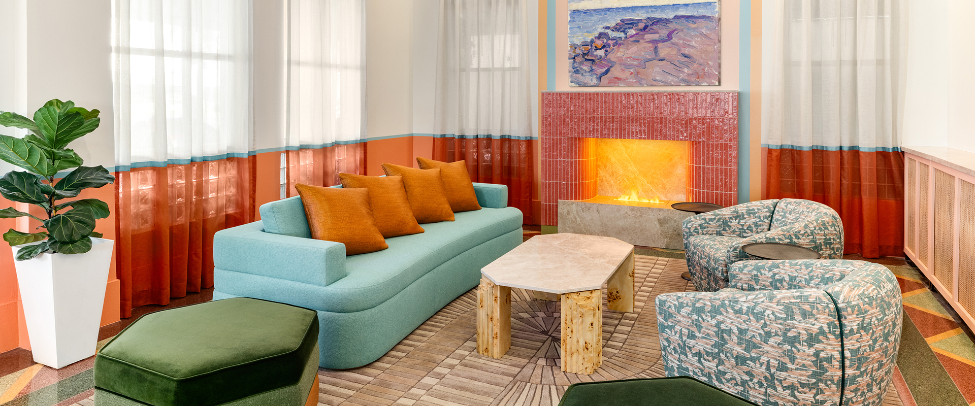 a living room with a couch and a fireplace