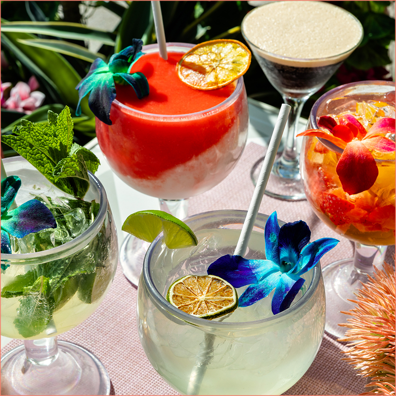 a group of drinks with flowers on them