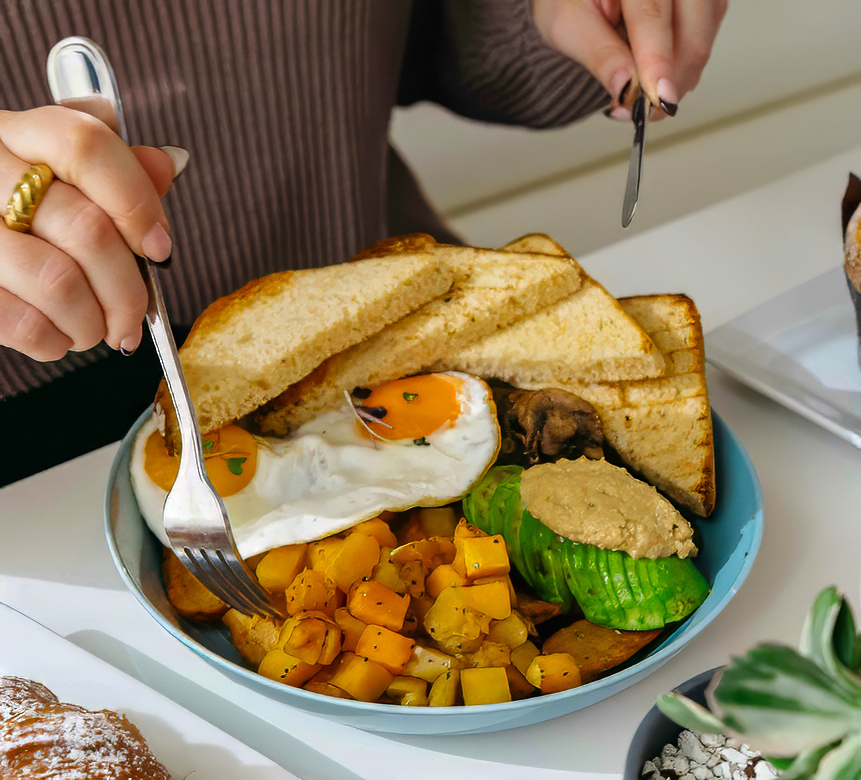 a person eating a bowl of food