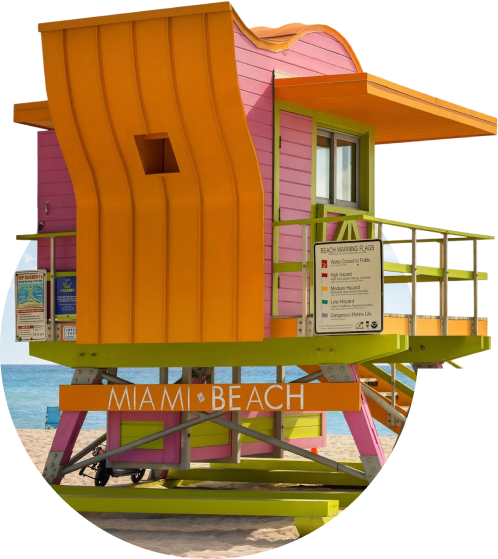 a colorful lifeguard tower on a beach