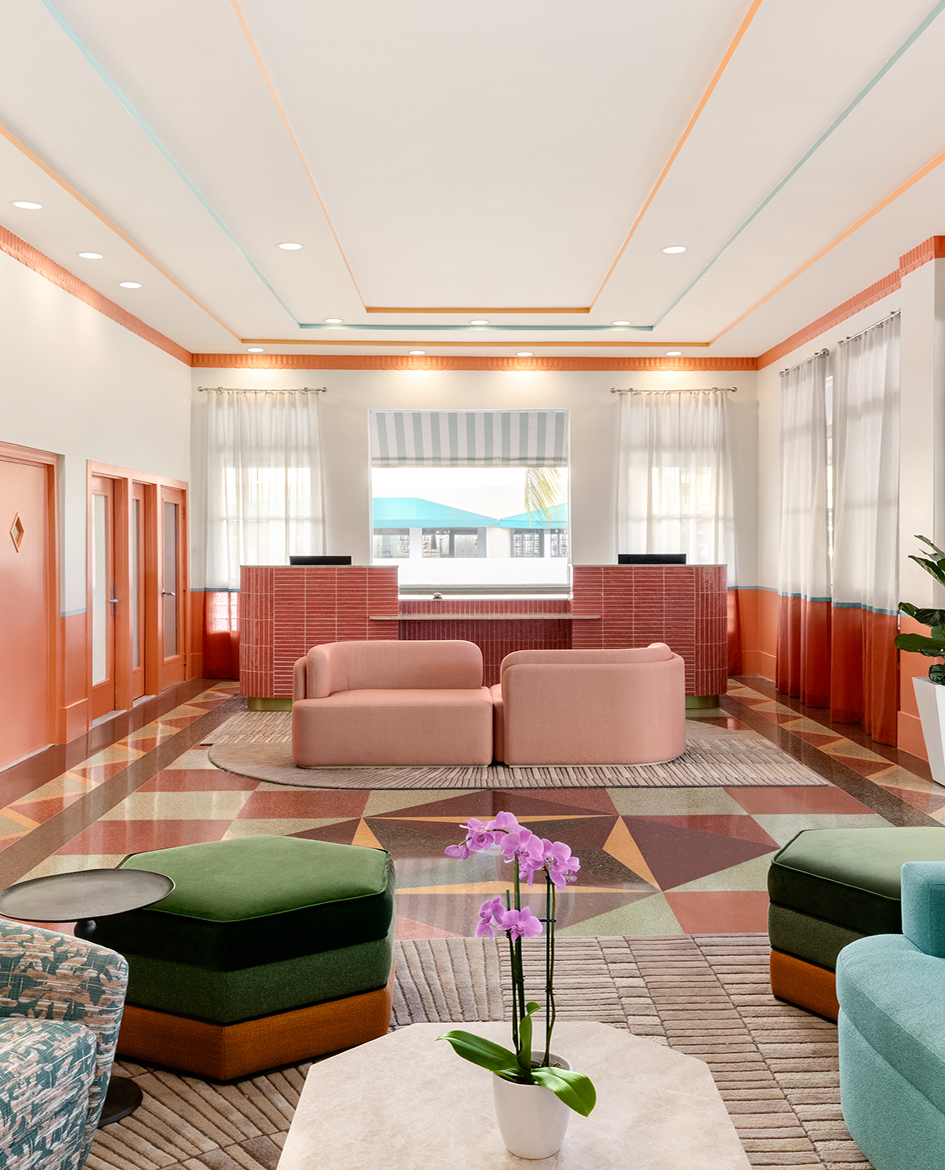 a room with colorful furniture and a flower pot
