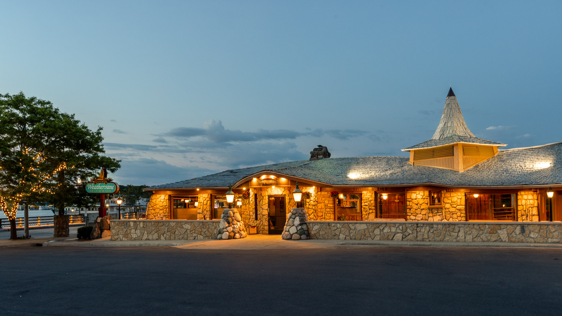 a building with a stone wall and a stone wall