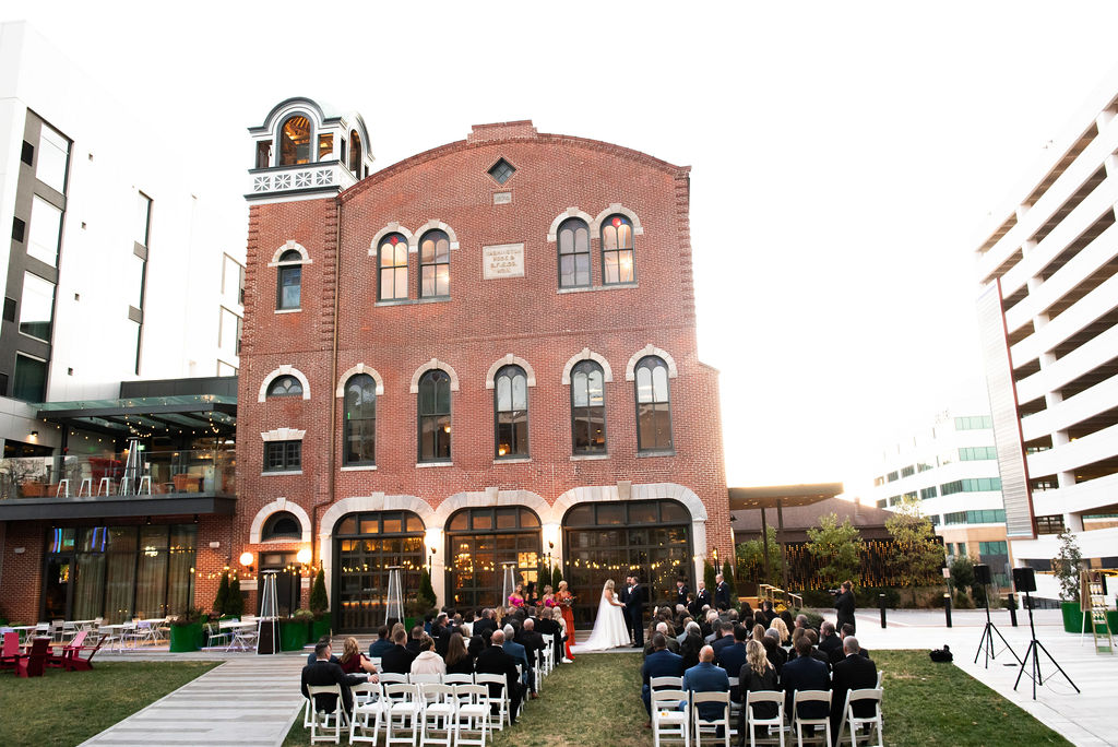 a group of people outside a building