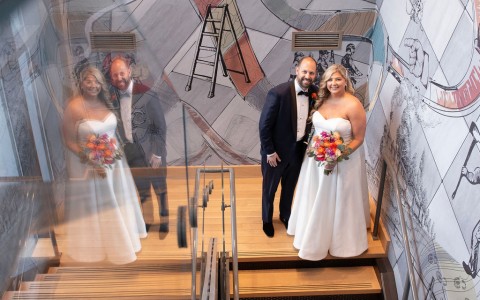 a group of people standing on stairs