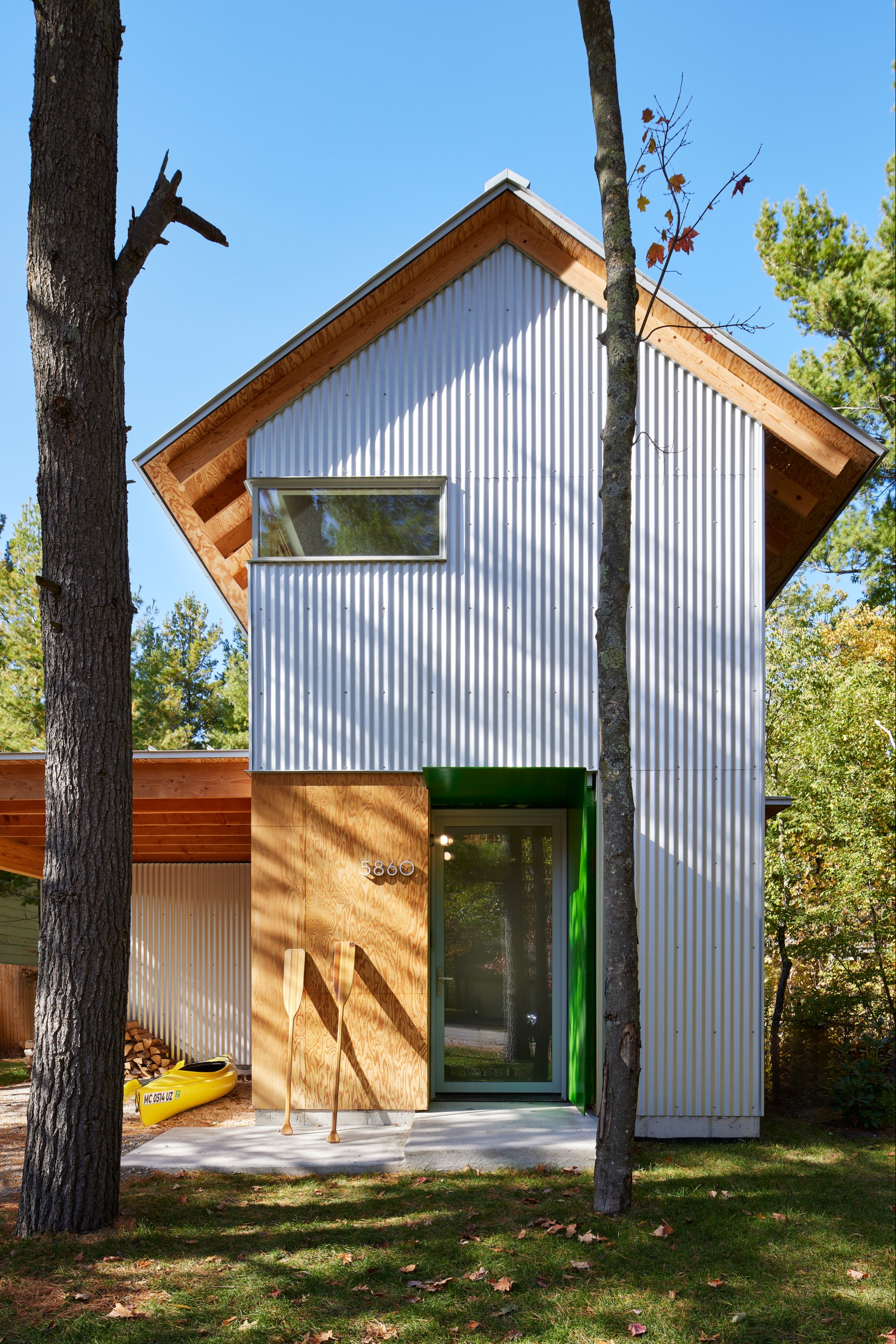 a house with trees in the background