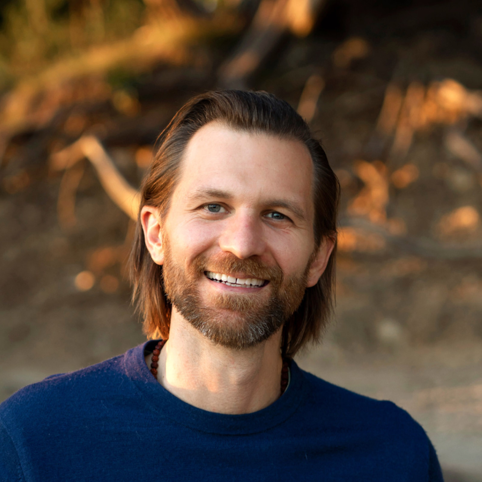 a man smiling for the camera