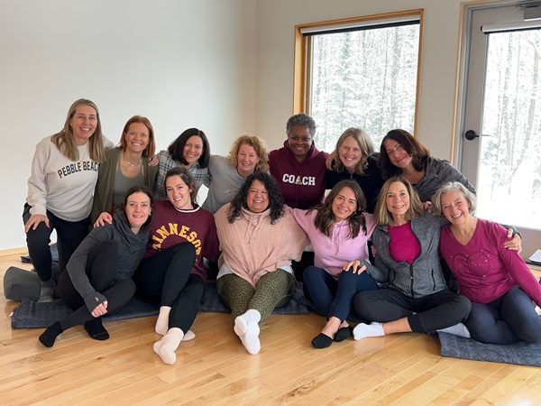 a group of women posing for a photo