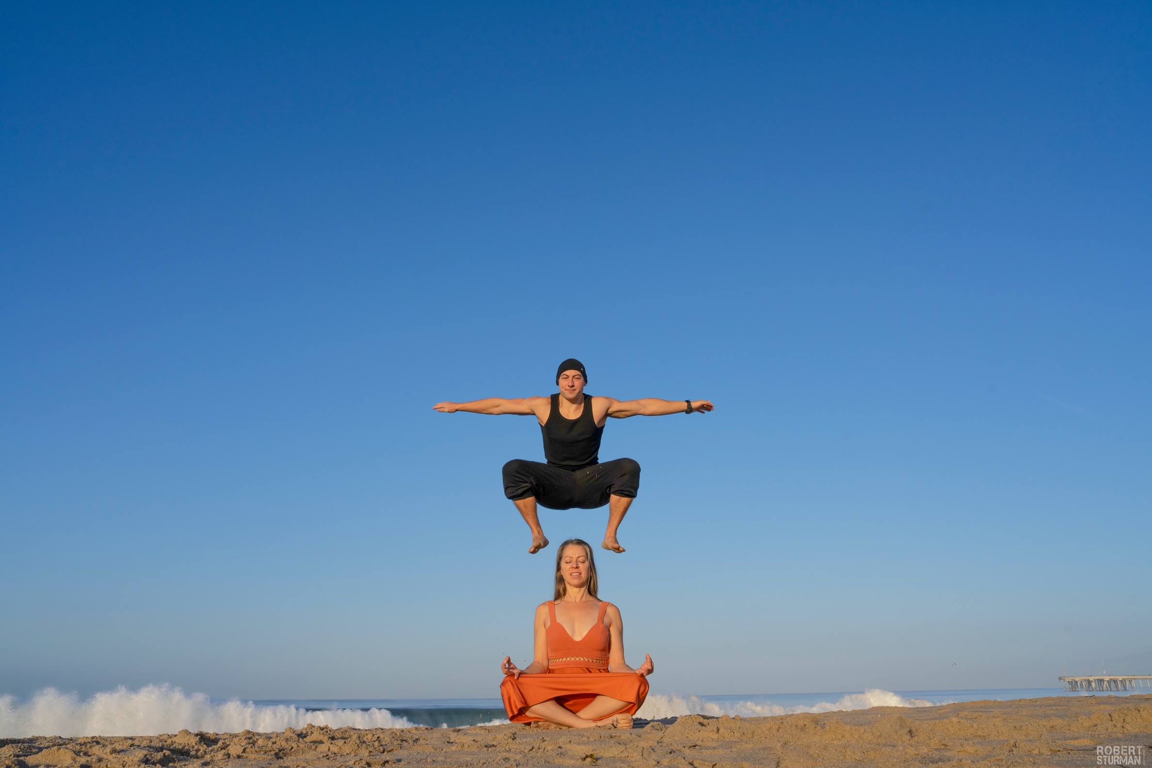 a man and woman on a beach