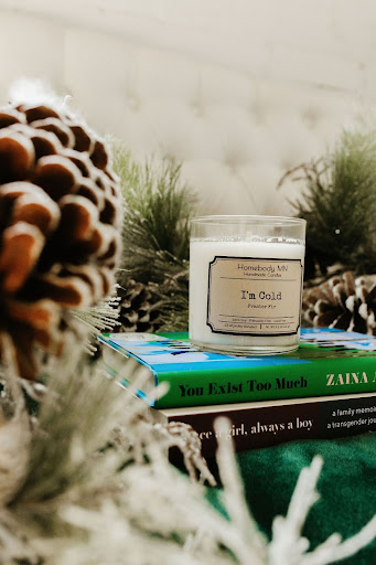 a candle on a book