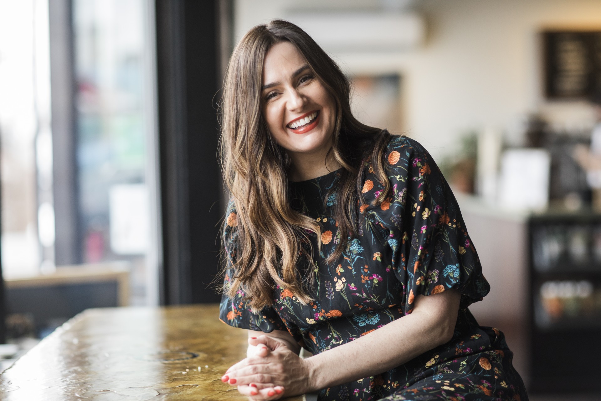 a woman smiling at camera