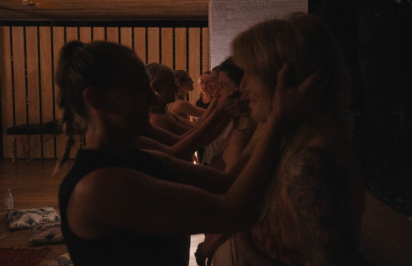 a group of people in a dark room
