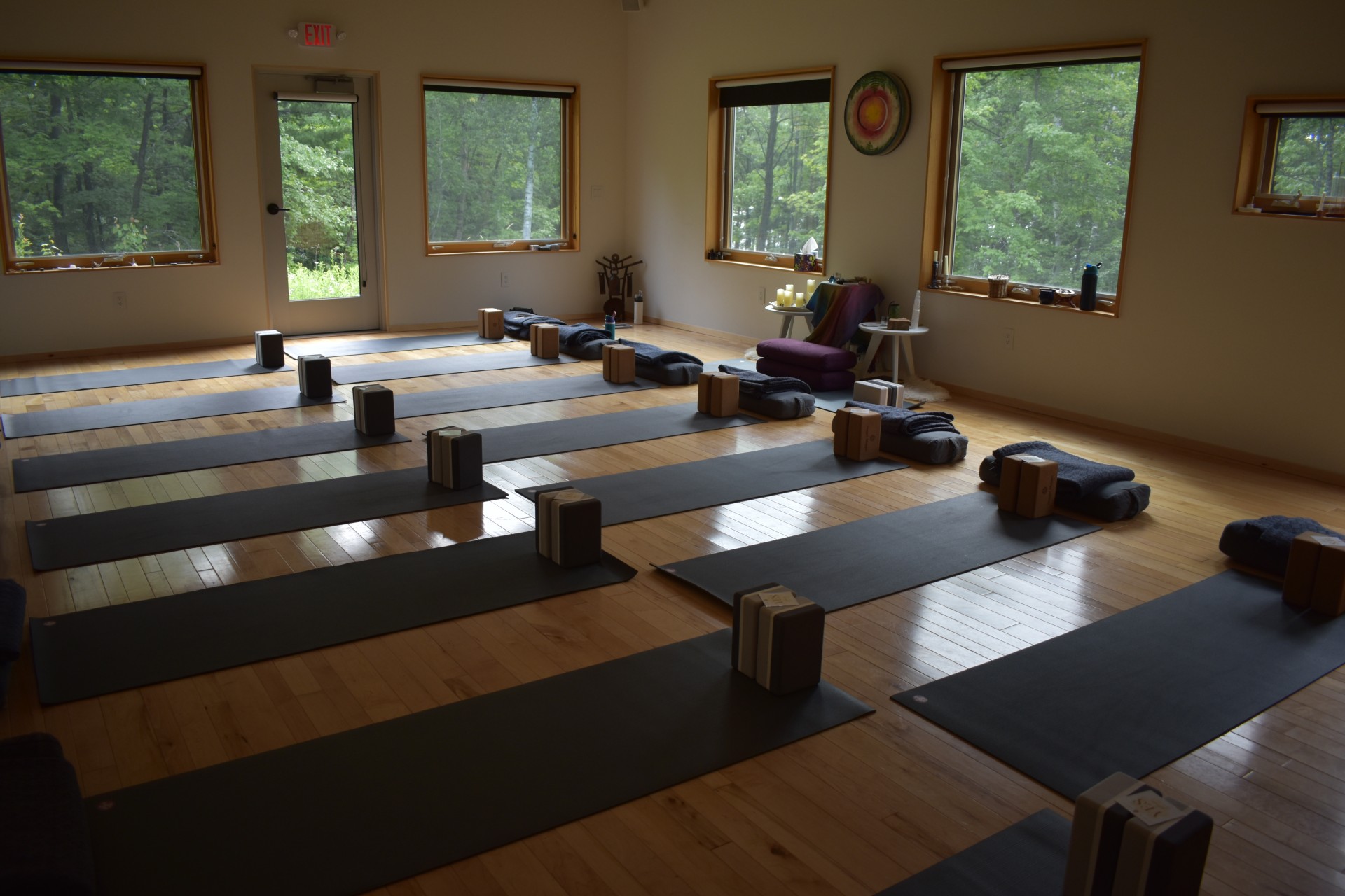 a room with mats and boxes on mats