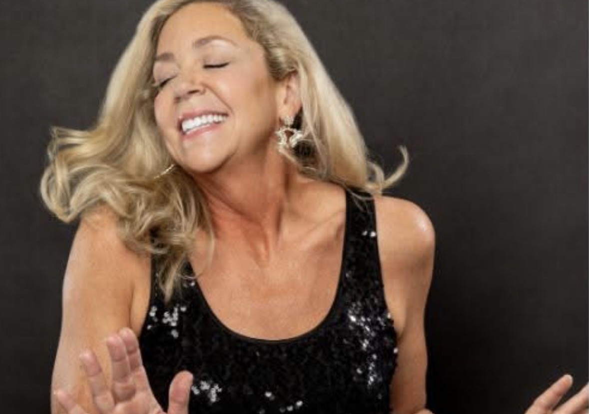 a woman with her eyes closed