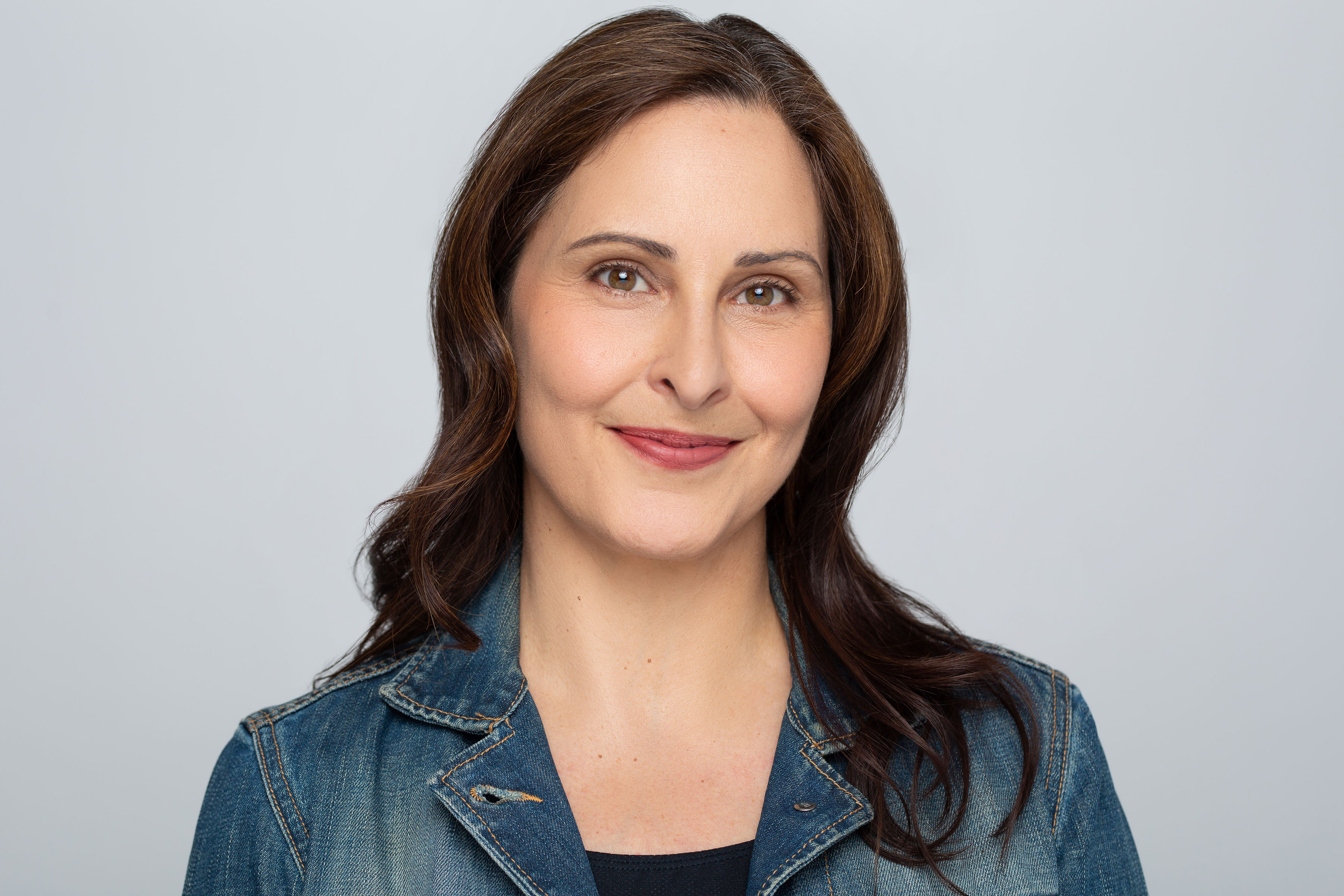 a woman smiling at camera