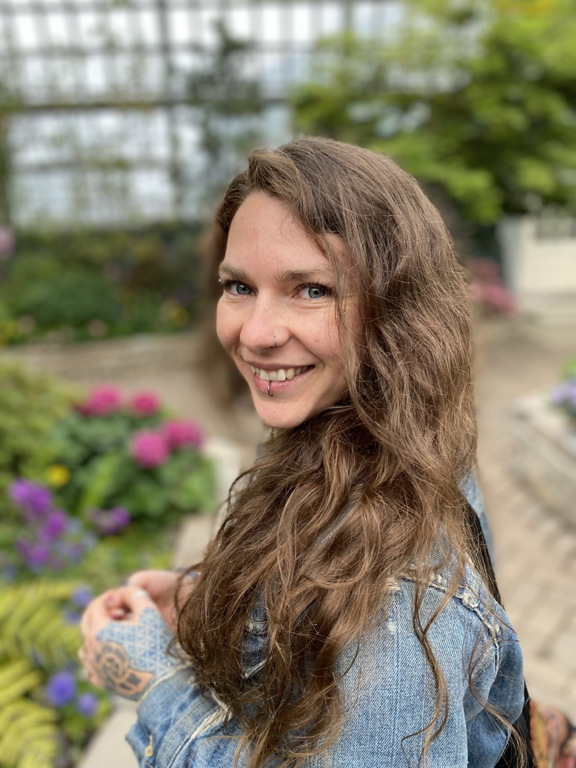 a woman smiling at the camera