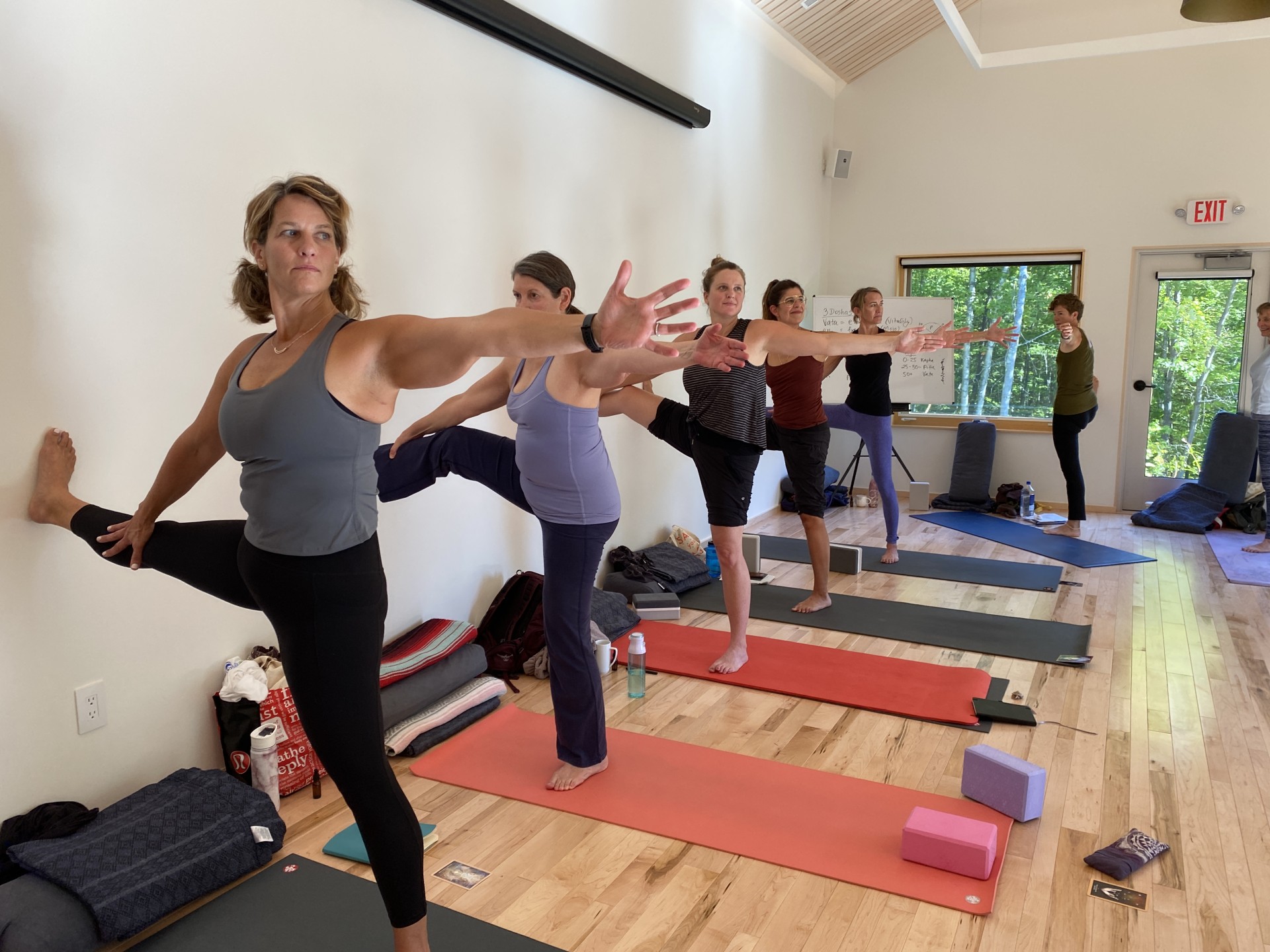 a group of people doing yoga