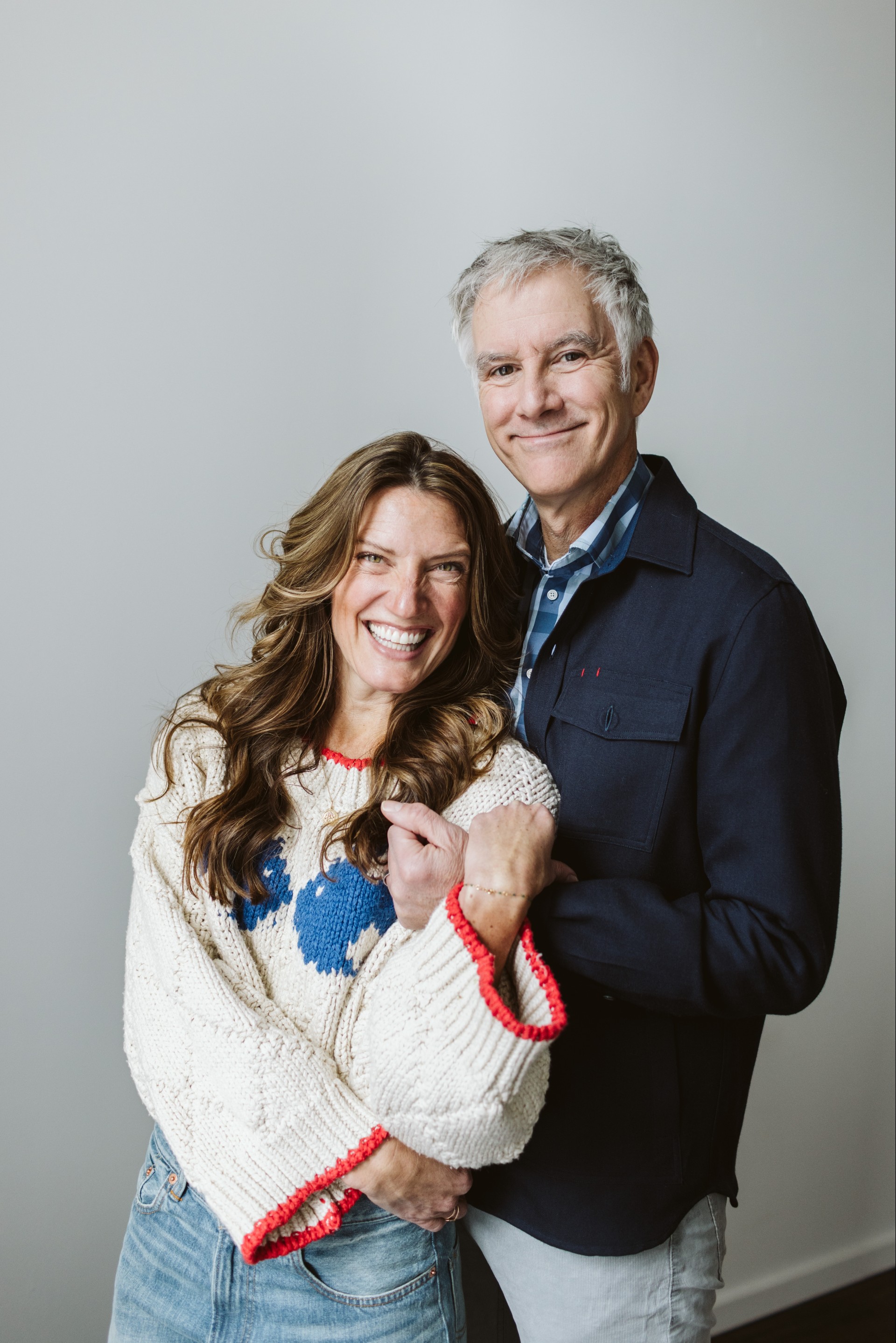 a man and woman posing for a picture