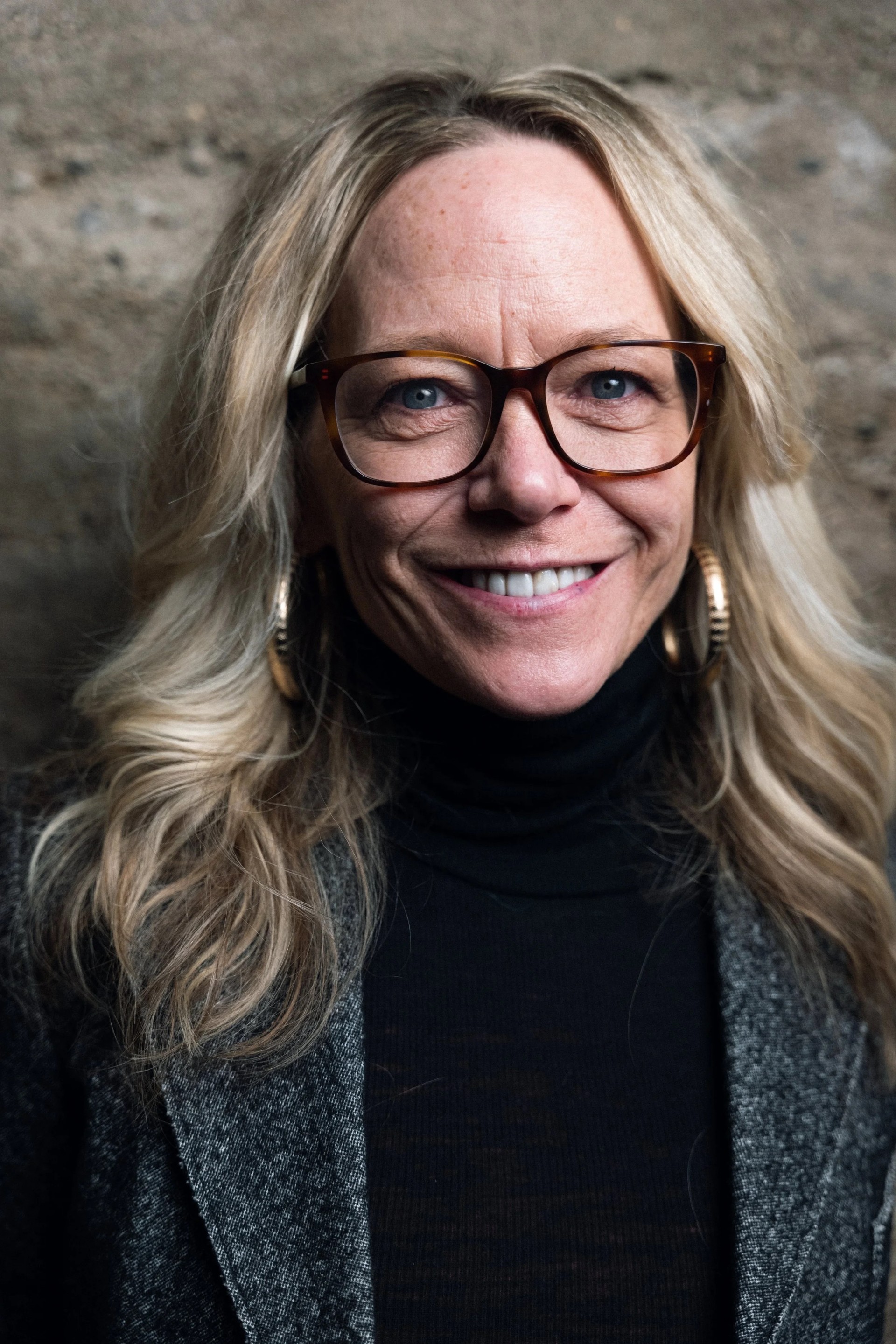 a woman smiling at camera